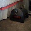 Sahara 1500 watt portable space heater next to bed